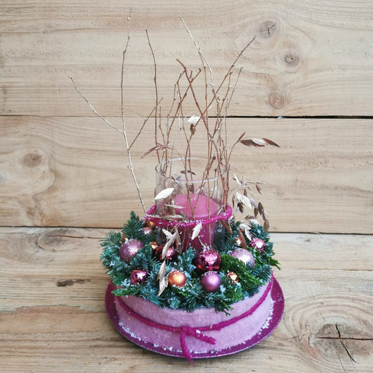 Roze Kersttaart met grote kaars